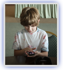 Photo of Blind Child Using V-Braille