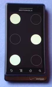 Photo of phone running a V-Braille application